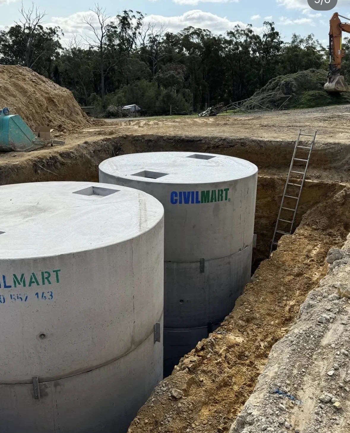 Both 33,000 litre concrete tanks installed side by side