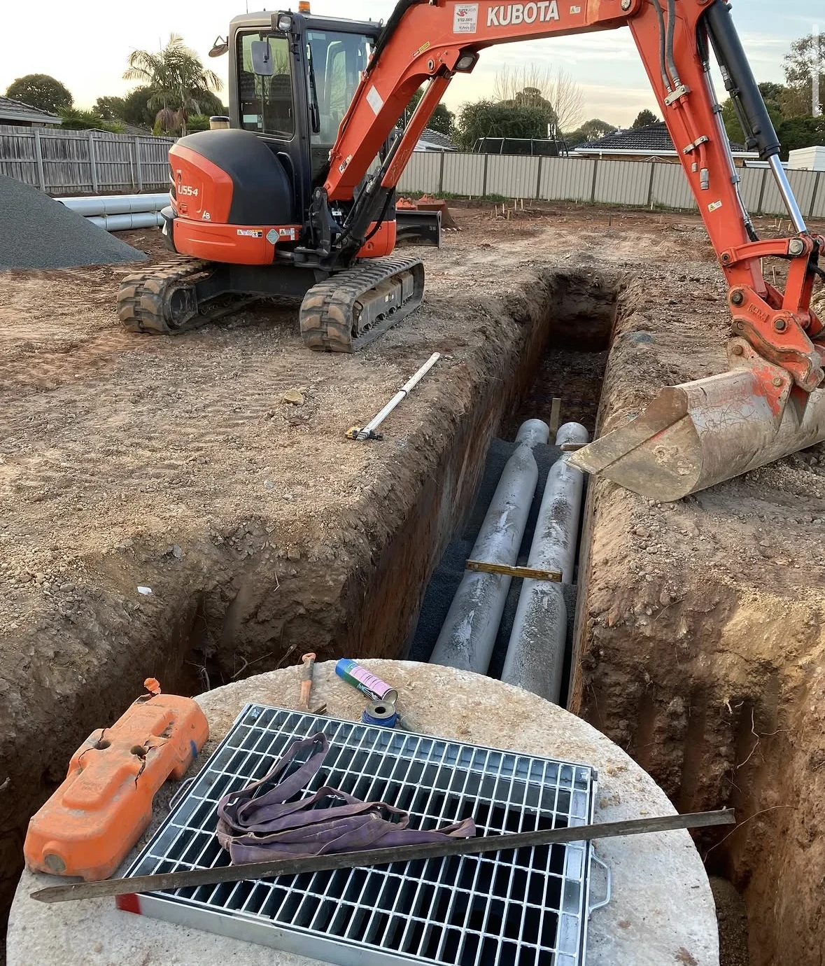 Barrel excavator, drainage pipes and a 10,000 litre pumping station on the six-unit development