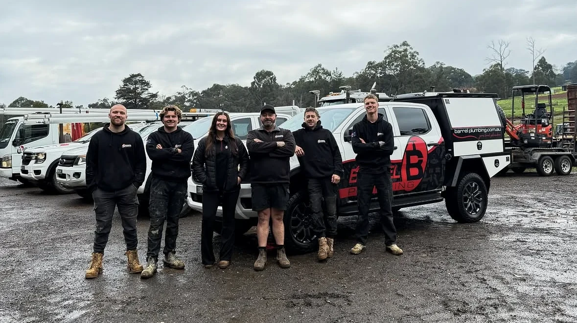 The Barrel Plumbing team with their branded fleet and equipment